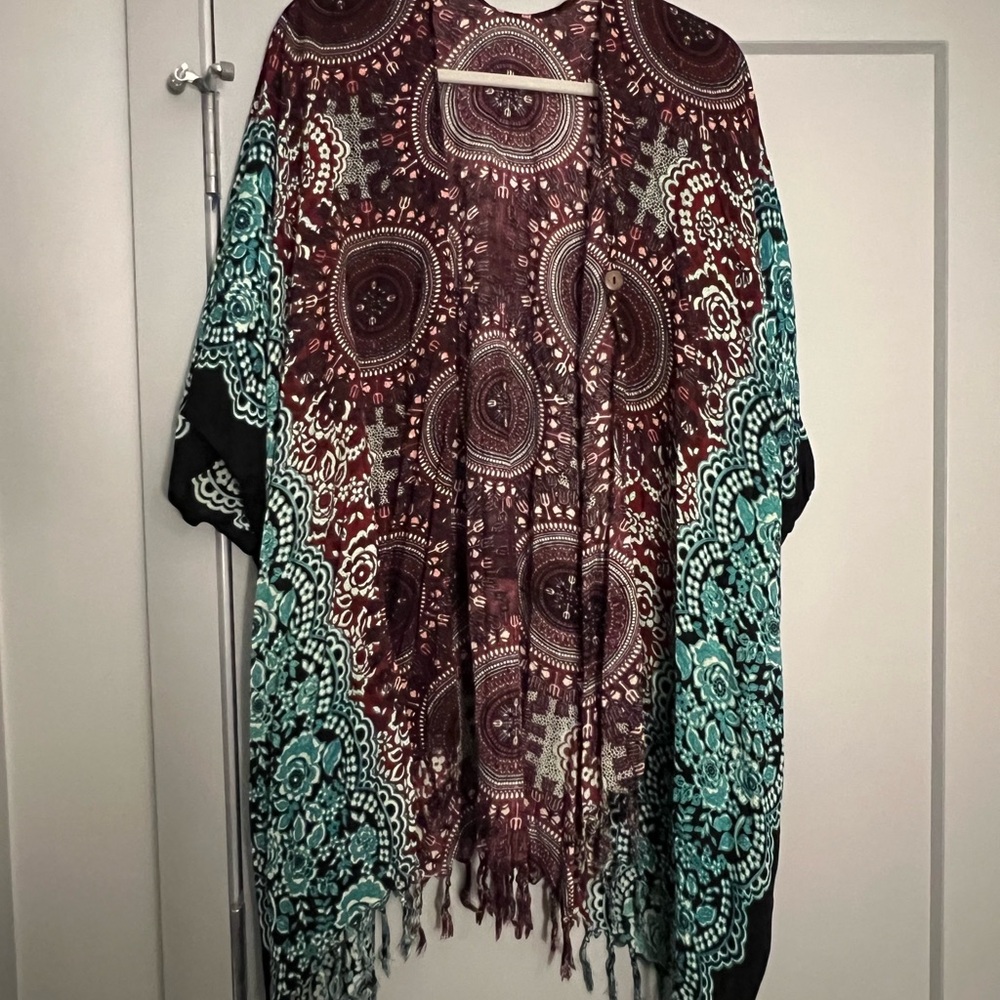 FREE DEAL. Kimono Top
Purchased any Kimono and choose a 2nd  for free!